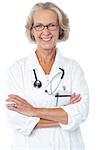 Cheerful lady doctor posing confidently