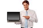 Salesman presenting brand new laptop