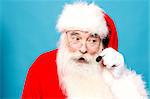 Santa with headset sharing christmas wishes to the callers