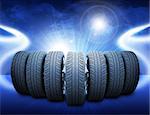 Wedge of new car wheels. Abstract blue background is lines and lights