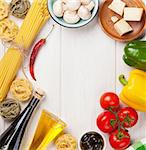 Italian food cooking ingredients. Pasta, tomatoes, peppers. Top view with copy space