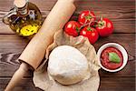 Pizza cooking ingredients. Dough, tomatoes and pasta