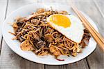Fried Char Kuey Teow which is a popular noodle dish in Malaysia, Indonesia, Brunei and Singapore