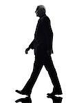 One Caucasian Senior Business Man walking Silhouette White Background