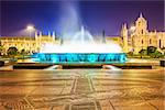 Belem, Lisbon, Portugal at the Jeronimos Monastery fountain at night.