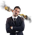 Businessman stressed out with ears in smoke