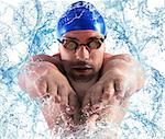 Professional swimmer enters the water with splash