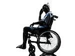 one injured man on the telephone happy in wheelchair in silhouette studio on white background