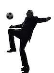 One Caucasian Senior Business Man playing soccer Silhouette White Background