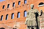 Ancient Roman bronze statue of Emperor Augustus, Porte Palatine city gate, Turin, Piedmont, Italy