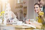 Two young women having meeting in cafe