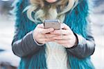 Close up of young woman texting on smartphone, Lake Como, Como, Italy