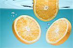 Slices of orange underwater