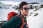 Close up of smiling young male skier, Mount Baker, Washington, USA
