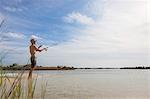 Mature man fishing, Fort Walton, Florida, USA