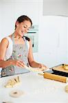 Smiling woman baking