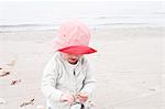 Baby girl on beach