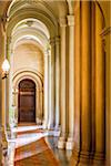 Hallway with arches, Penrhyn Castle, Llandegai, Bangor, Gwynedd, Wales, United Kingdom