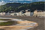 Beach and coastal shoreline with buildings along waterfront, Llandudno, Conwy County, Wales, United Kingdom