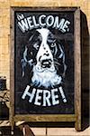 Close-up of sign, welcoming dogs, Bourton-on-the-Water, Gloucestershire, The Cotswolds, England, United Kingdom