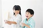 Japanese kids washing hands in the bathroom