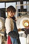 Young Japanese woman enjoying glass crafting workshop in Kawagoe, Japan
