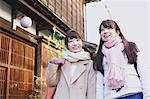 Young Japanese women enjoying trip in Kawagoe, Japan