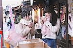 Young Japanese women enjoying trip in Kawagoe, Japan