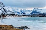 Reine fishing village covered in snow, Norway