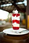 Fresh parfait in glass on restaurant table