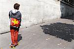 Teenager on his skateboard in the street