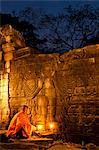 Camdodia, Banteay Mean Chey Province, Banteay Chhmar temples, Site World Heritage of Humanity by Unesco in 1992, Banteay Chhmar temple, the monk Chean Som praying in front of Avalokiteshvara, a major character of Buddhism