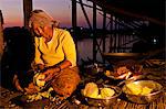 Camdodia, Siem Reap Province, Tonle Sap Lake, site classified Unesco biosphere in 1997, the Kampong Klaeng village, Kié Man cooking for the diner