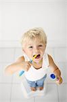 Little boy brushing his teeth