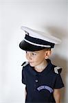 Little boy dressed up as a policeman