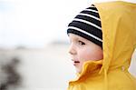 3 years old boy looking at the beach