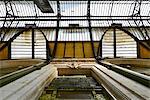 Europe, France, Paris, view dive against a portion of the canopy in the hall of the Gare de Lyon. Metal frame and stone arch