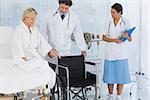 Patient trying to sit on wheelchair in hospital