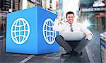 Businessman using laptop and cheering against blurry new york street