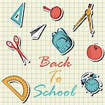 Back to school  in flat design on checkered paper sheet