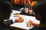 Couple drinking in a fashionable bar