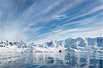 View of a polar research vessel, a large boat in an inlet.