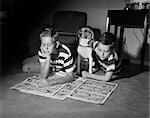 1950s TWO BOYS READING SUNDAY COMICS LIVING ROOM FLOOR DOG INDOOR FUNNY PAPERS NEWSPAPERS