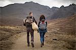 Family hiking on path, Fairy Pools, near Glenbrittle, Isle of Skye, Hebrides, Scotland