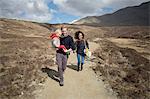 Family out hiking, Fairy Pools, Isle of Skye, Hebrides, Scotland