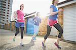 Three women exercising and jogging together