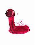 Abstract of piece of red lipstick and smudge
