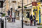 Street scene with stores and restaurants, Bath, Somerset, England, United Kingdom