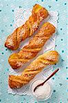 Puff pastry twists with sugar and vanilla cream