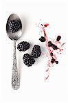 Blackberries with a spoon